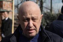 Yevgeny Prigozhin, the owner of the Wagner Group military company, arrives during a funeral cer ...