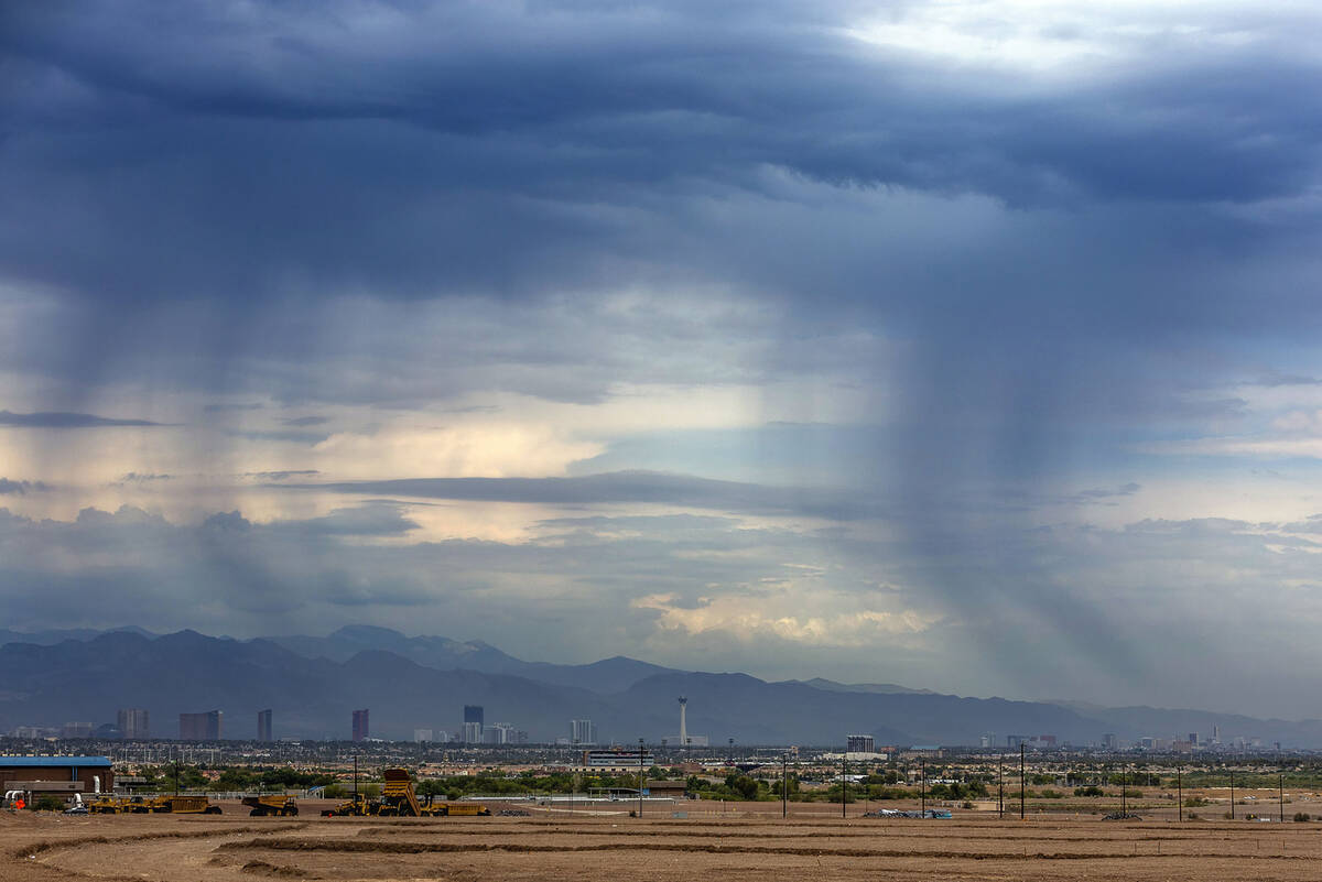 Another thunderstorm moves across the valley dropping rain on Thursday, Aug. 4, 2022, in Las Ve ...