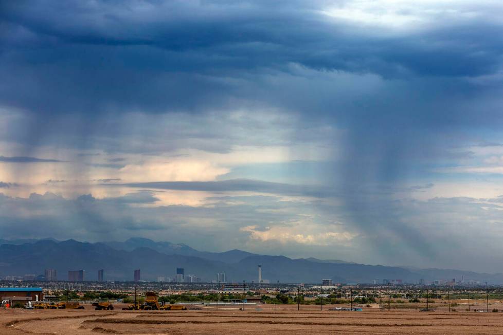 Another thunderstorm moves across the valley dropping rain on Thursday, Aug. 4, 2022, in Las Ve ...