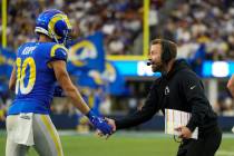 Los Angeles Rams wide receiver Cooper Kupp (10) celebrates a touchdown with head coach Sean McV ...