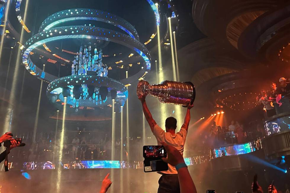 Reilly Smith holds aloft the Stanley Cup at Omnia at Caesars Palace after the Vegas Golden Knig ...
