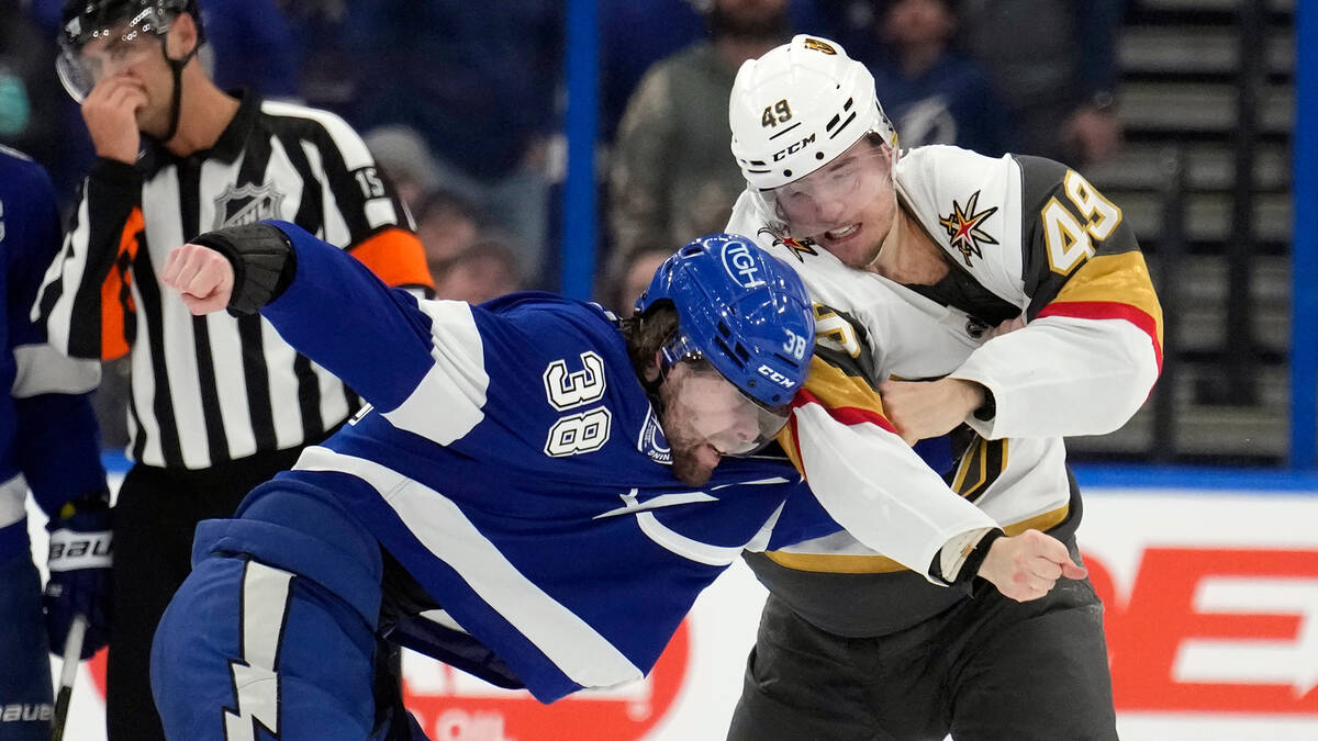 Vegas Golden Knights center Ivan Barbashev (49) and Tampa Bay Lightning left wing Brandon Hagel ...