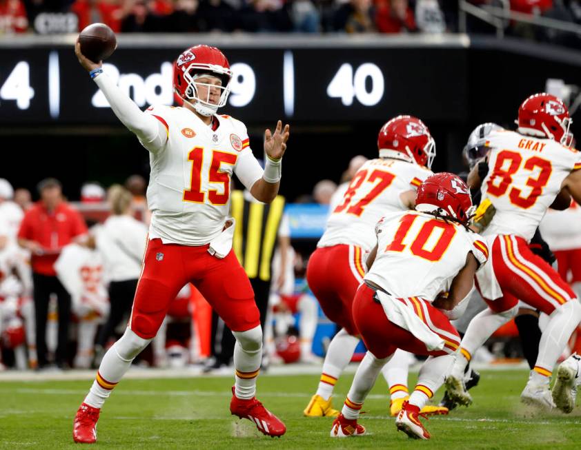 Kansas City Chiefs quarterback Patrick Mahomes (15) throws a pass against Raiders during the fi ...