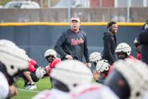 UNLV football coach Barry Odom watches his team practice in preparation for Tuesday's Guarantee ...