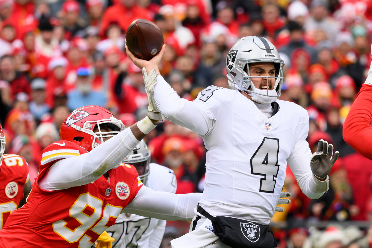 Kansas City Chiefs defensive tackle Chris Jones (95) pressures Las Vegas Raiders quarterback Ai ...