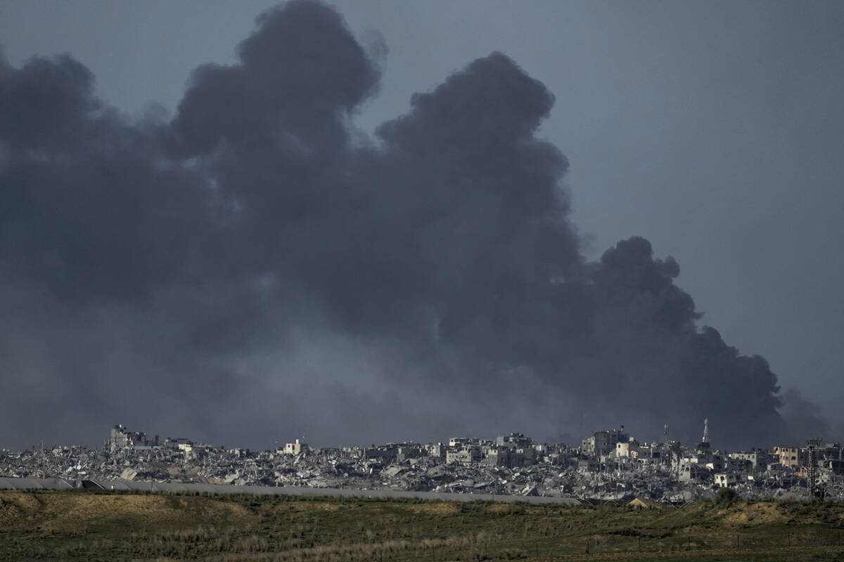 Smoke rises following an Israeli bombardment in the Gaza Strip, as seen from southern Israel, T ...