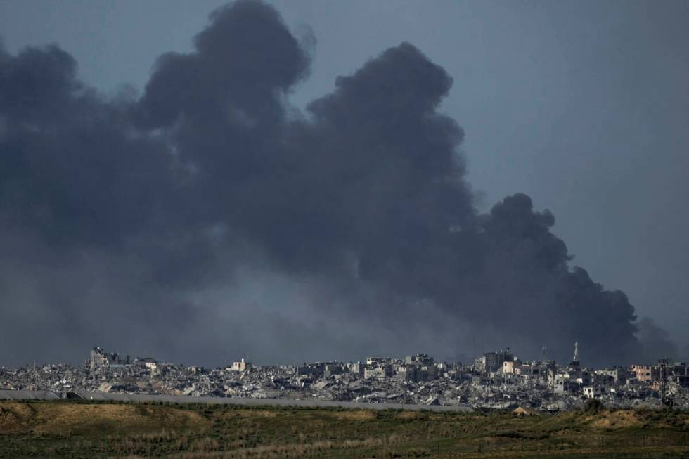 Smoke rises following an Israeli bombardment in the Gaza Strip, as seen from southern Israel, T ...