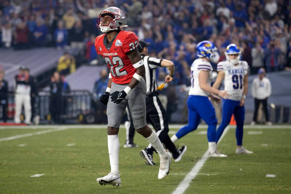 UNLV Rebels defensive back Ricky Johnson (32) reacts after Kansas Jayhawks scored a touchdown d ...