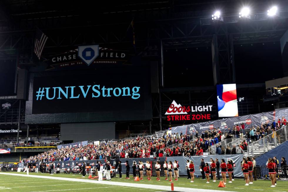 A moment of silence is taken for the victims of a recent shooting at the University of Nevada L ...