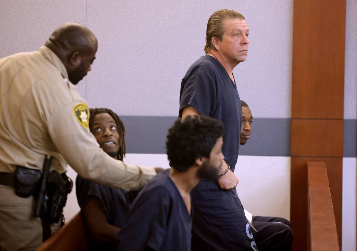 Christopher Hall, who is accused in a fatal shooting involving a stolen car, appears in court a ...