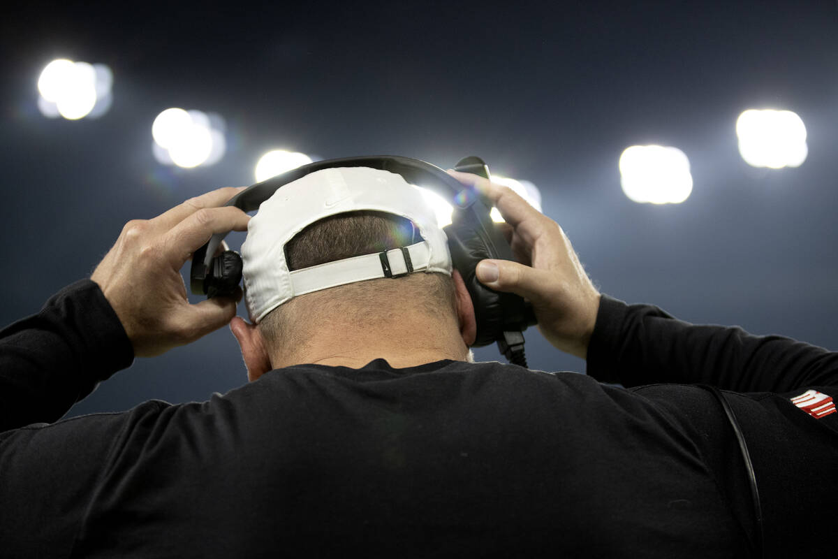 UNLV Rebels head coach Barry Odom adjusts his headset during the second half of the Guaranteed ...