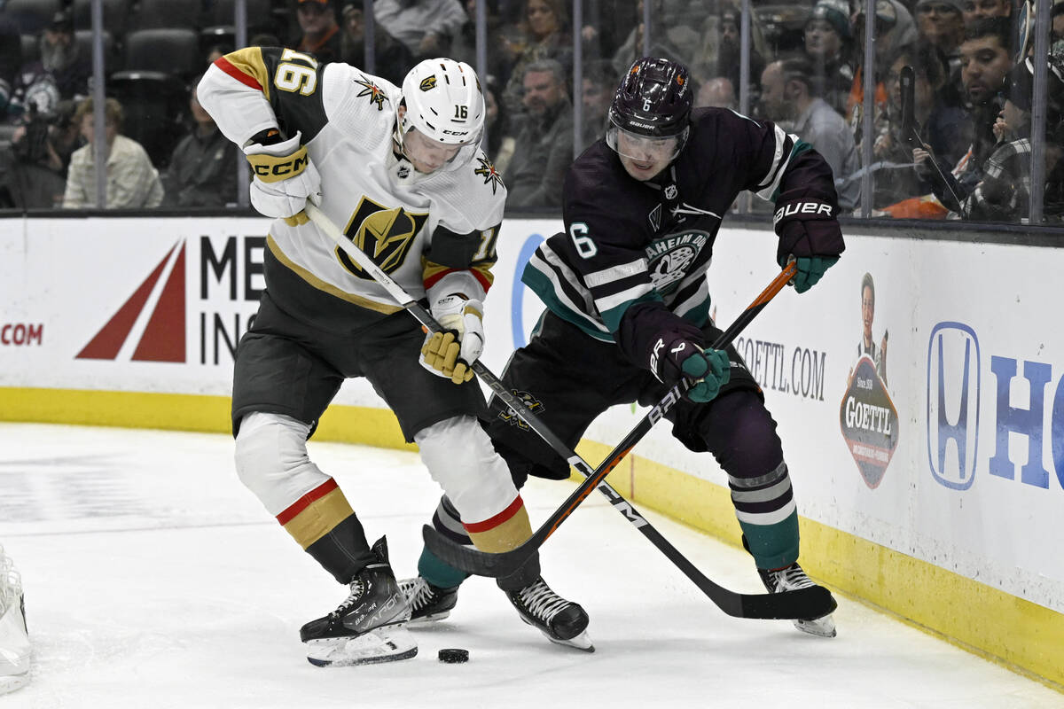 Vegas Golden Knights left wing Pavel Dorofeyev, left, vies for the puck against Anaheim Ducks d ...