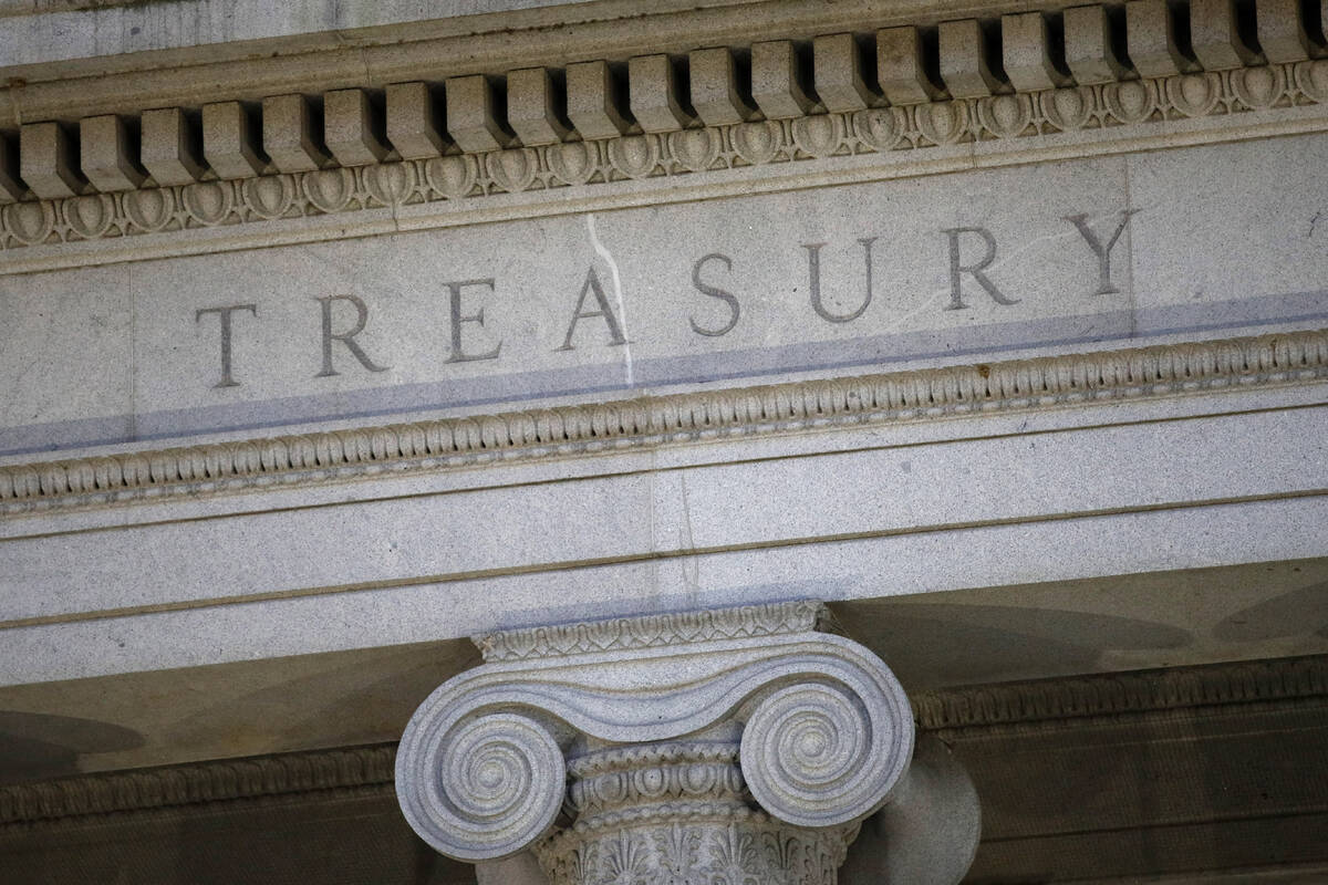 FILE- The U.S. Treasury Department building is shown at dusk in Washington on June 6, 2019. (AP ...