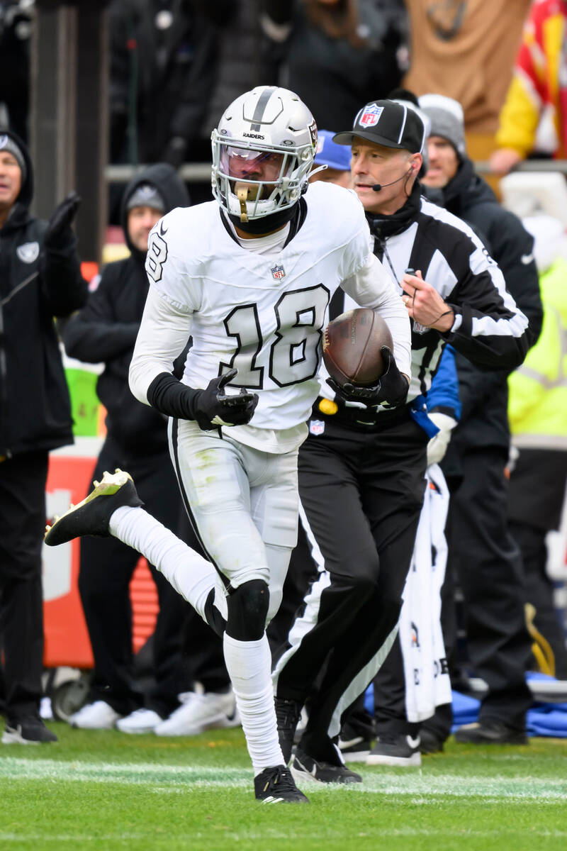 Las Vegas Raiders cornerback Jack Jones runs an interception in for a touchdown against the Kan ...