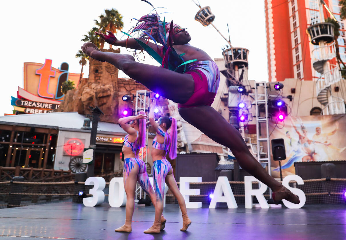 Artist Thomas Archey of "Mystère" by Cirque du Soleil is shown at a pop up performance to comm ...