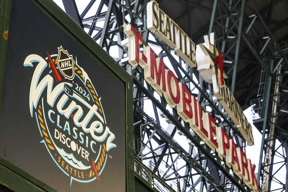 Signage for the New Year's Day NHL hockey Winter Classic between the Seattle Kraken and the Veg ...