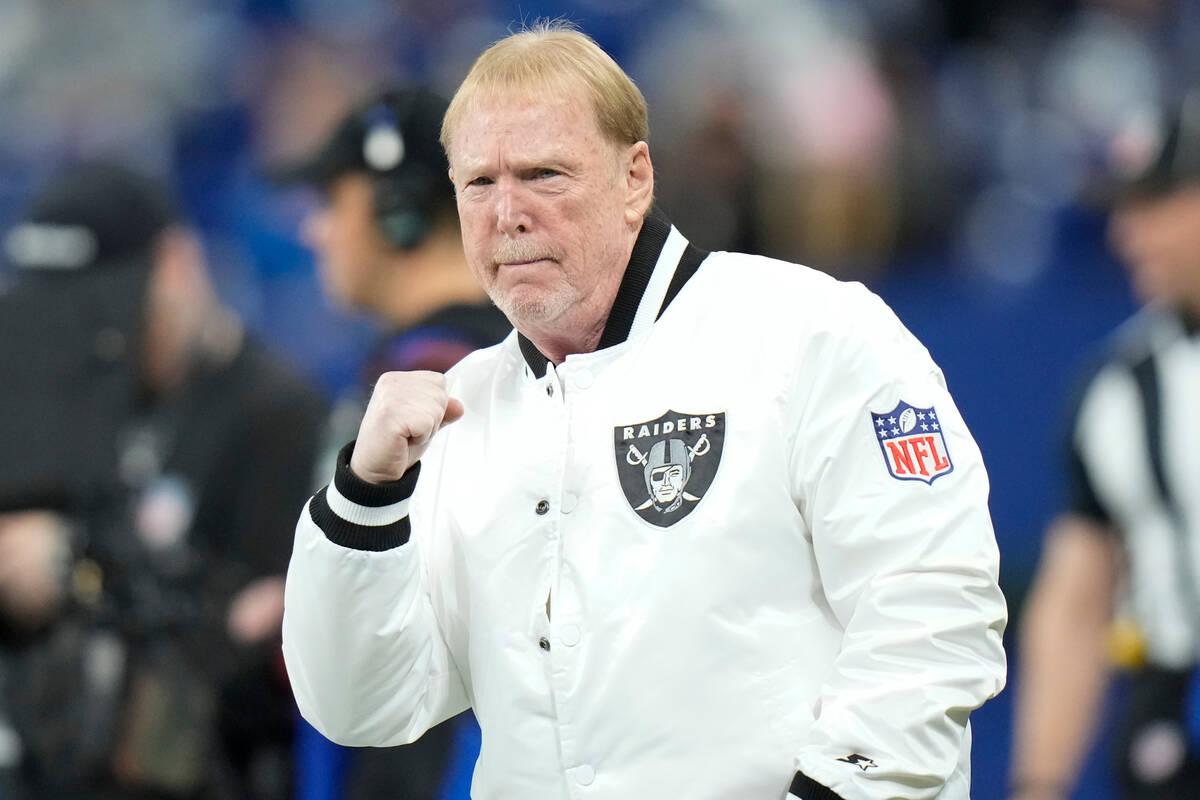 Las Vegas Raiders owner Mark Davis watches warms ups on the field before an NFL football game b ...
