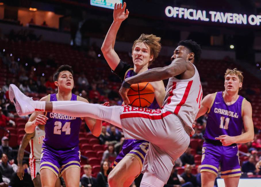 UNLV Rebels forward Kalib Boone (10) rebounds the ball during a college basketball game against ...