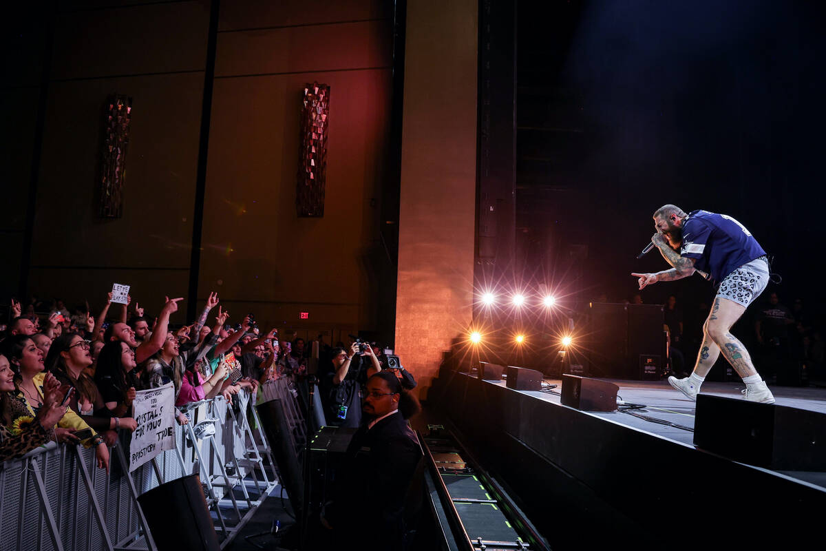 LAS VEGAS, NEVADA - DECEMBER 30: Post Malone performs onstage as Fontainebleau Las Vegas rings ...