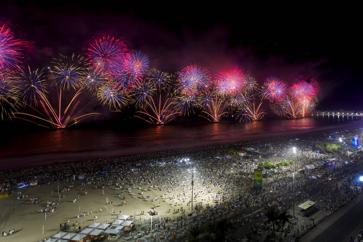 Fireworks light up Copacabana Beach during New Year's celebrations in Rio de Janeiro, Brazil, e ...