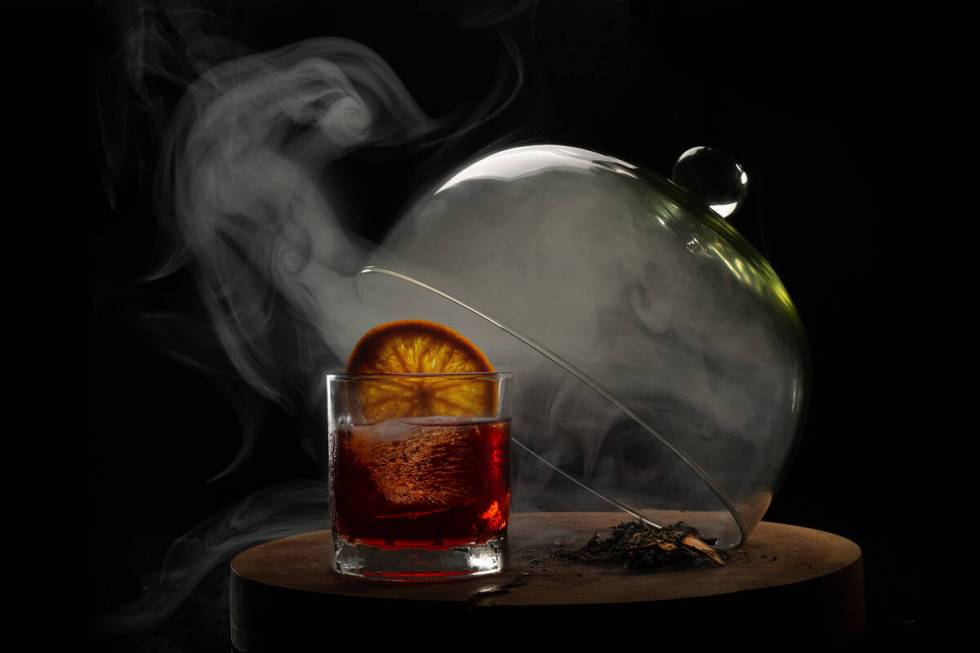 Cocktails bathed in smoke, a technique first introduced to lend aroma and flavor, has become a ...