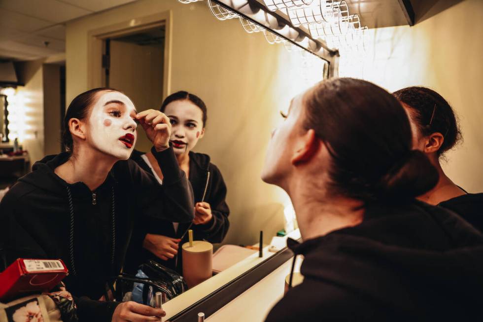 Dancers apply their makeup before a dress rehearsal for the Nutcracker at the Smith Center on T ...