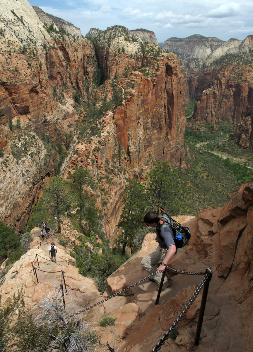 Hikers climb down the Angels Landing trail in Zion National Park in Utah in May 2021. (Jud Burk ...