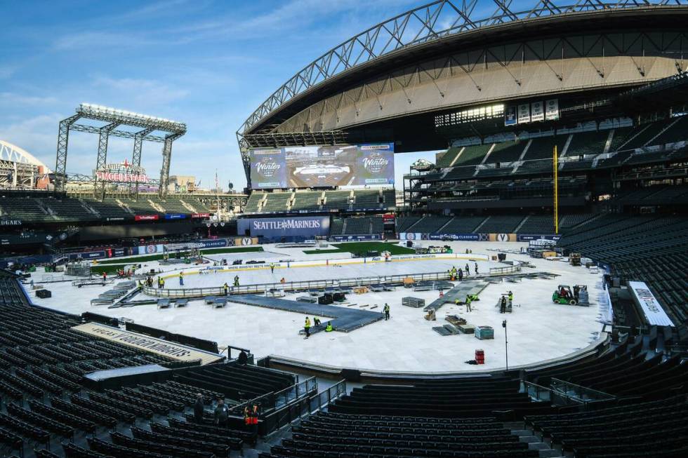 Construction of the rink for the New Year's Day NHL hockey Winter Classic between the Seattle K ...