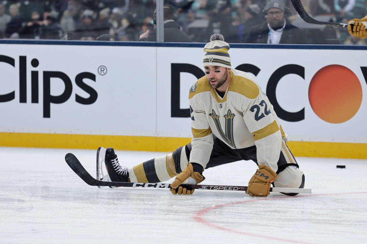 Vegas Golden Knights right wing Michael Amadio (22) stretches on the ice during warmups before ...