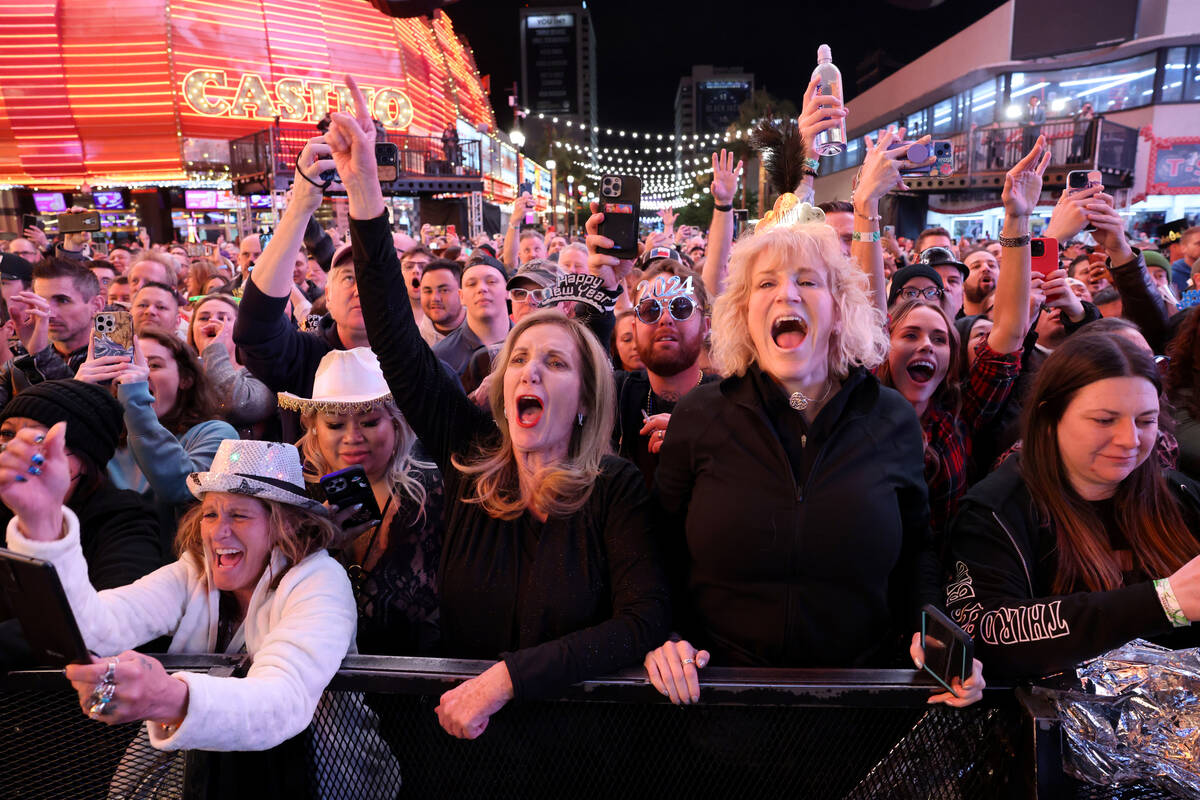 New Year’s Eve revelers, including from left, Elizabeth Martinez of Las Vegas, Donna Smi ...