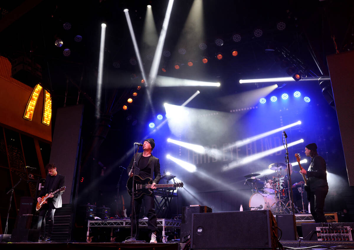 Third Eye Blind performs on the 3rd Street Stage during the New Year’s Eve Time of Your ...