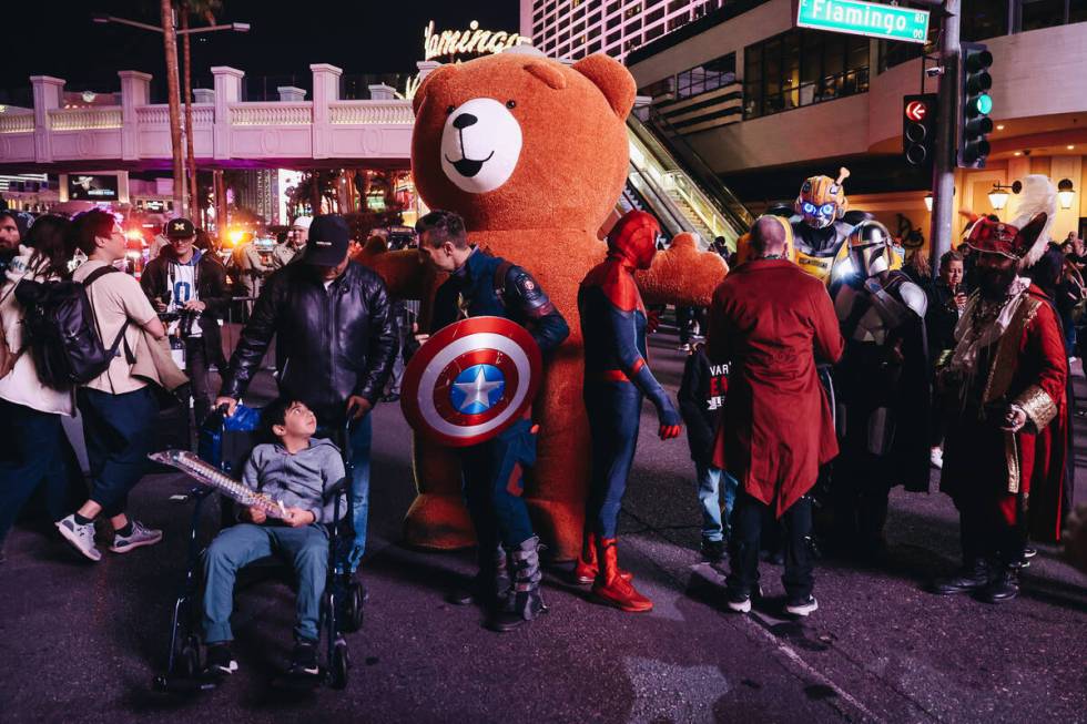 Character buskers gather in the streets after they were closed off for pedestrians to enjoy New ...