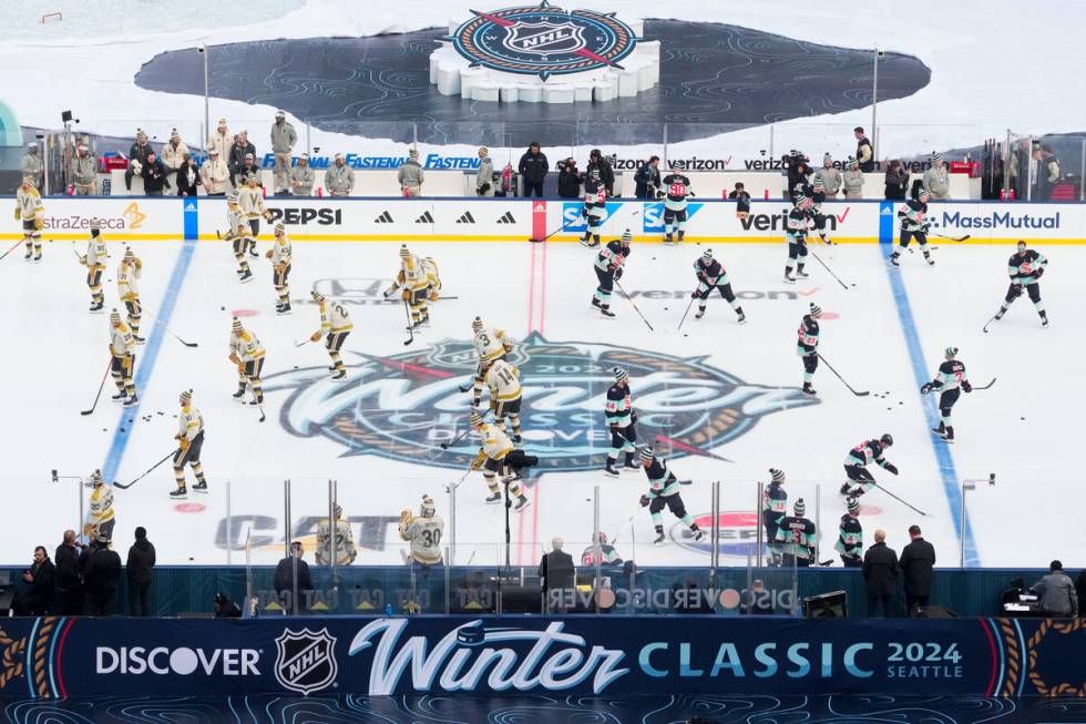 The Seattle Kraken and the Vegas Golden Knights warm up on the ice before the NHL Winter Classi ...