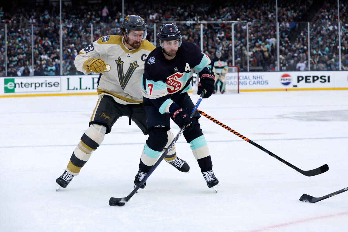 Seattle Kraken right wing Jordan Eberle (7) skates with the puck with Vegas Golden Knights righ ...