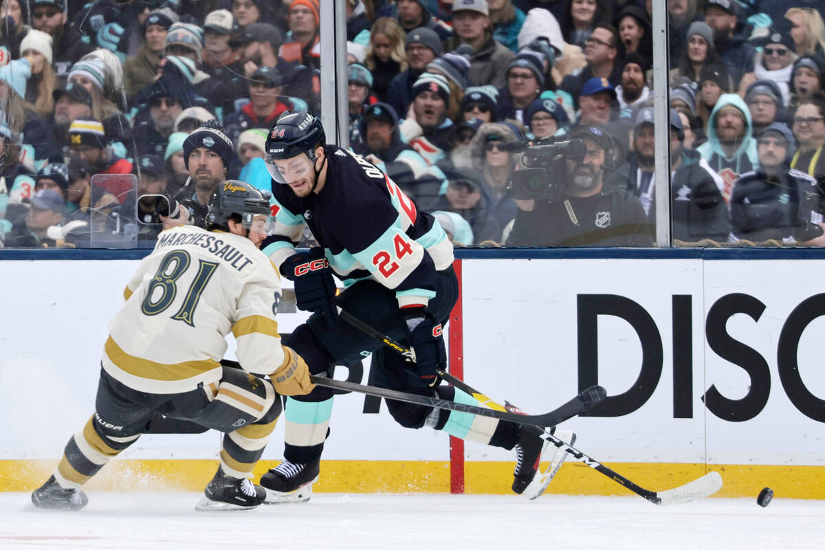 Vegas Golden Knights right wing Jonathan Marchessault (81) vies for the puck with Seattle Krake ...