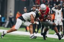 UNLV quarterback Doug Brumfield (2) runs the ball near the end zone during a game against Bryan ...