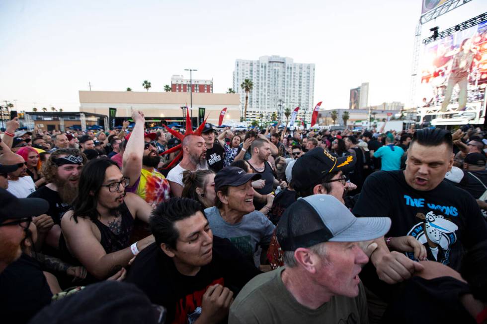 Fans mosh as The Interrupters perform during the Punk Rock Bowling music festival on Saturday, ...