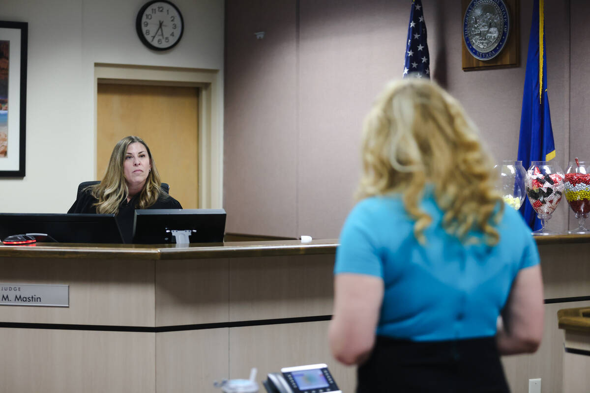 Clark County Family Court Judge Amy Mastin addresses prosecutor Summer Clarke during a certific ...