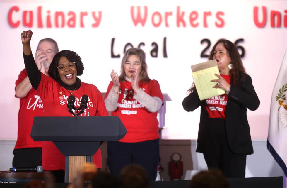 Culinary Union member Linda Hunt, a food server at the El Cortez for 45 years, fires up the the ...