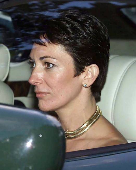 FILE - In this Sept. 2, 2000 file photo, British socialite Ghislaine Maxwell, driven by Britain ...