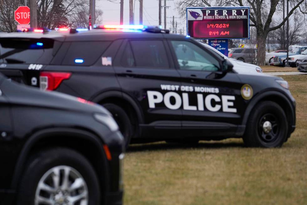 Police respond to Perry High School in Perry, Iowa., Thursday, Jan. 4, 2024. Police say there h ...