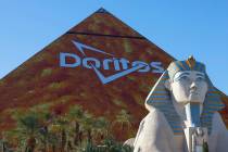 The Doritos ad wraps the east side of the Luxor, on Thursday, Jan. 4, 2024, in Las Vegas. (Bizu ...