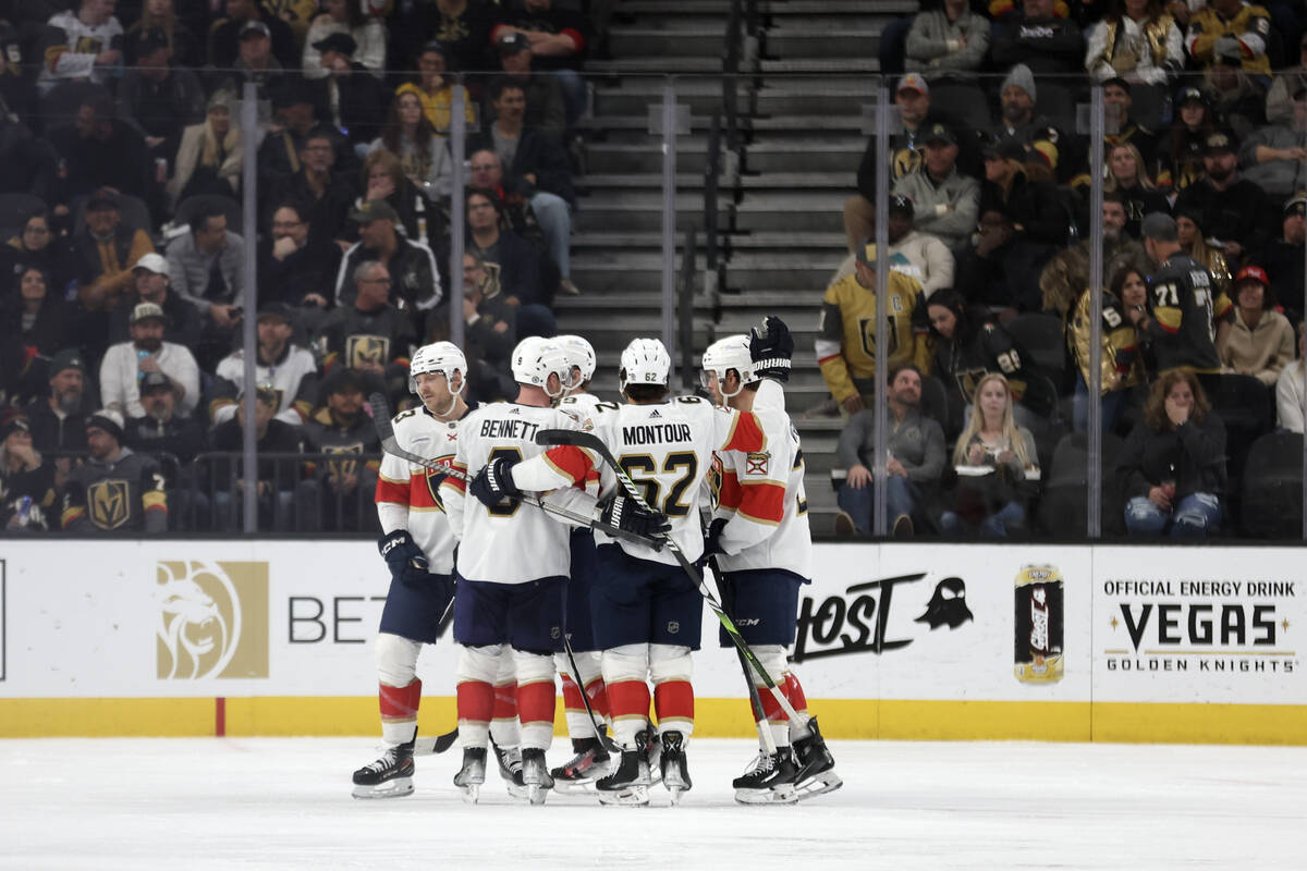 The Florida Panthers celebrate a third period goal against the Vegas Golden Knights during an N ...