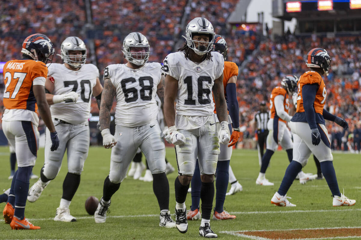 Raiders wide receiver Jakobi Meyers (16) celebrates his second touchdown score of the day durin ...