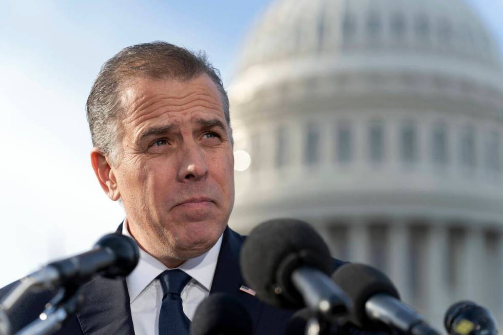 Hunter Biden, son of President Joe Biden, talks to reporters at the U.S. Capitol, in Washington ...