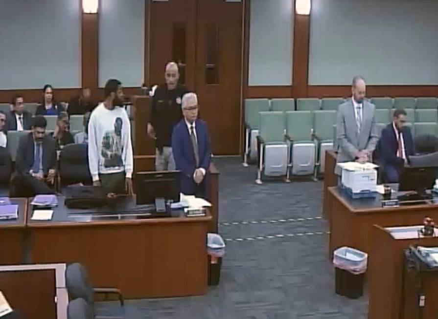 This is a video screen shot of defendant Deobra Redden attacking Judge Mary Kay Holthus after a ...