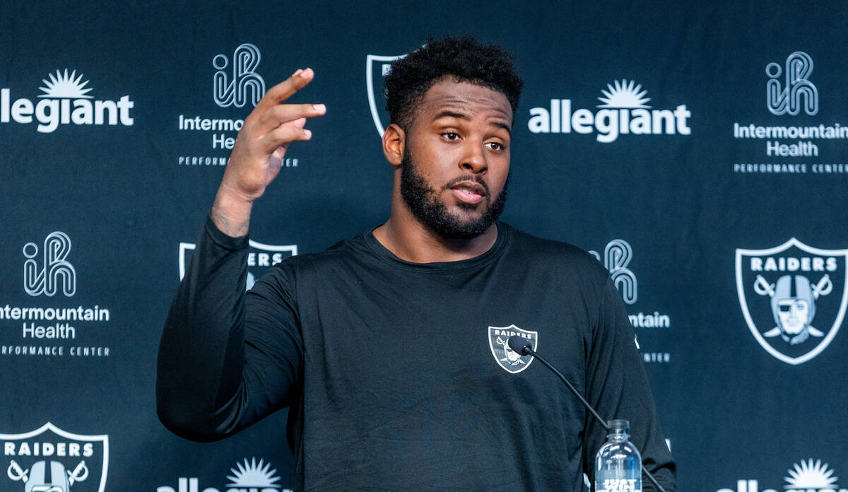 Raiders offensive tackle Thayer Munford Jr. (77) answers a question during a press conference i ...