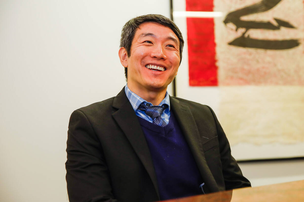 Meng Zhong, Pro Bono Attorney of the Year as honored by the Legal Aid Center, speaks with the L ...