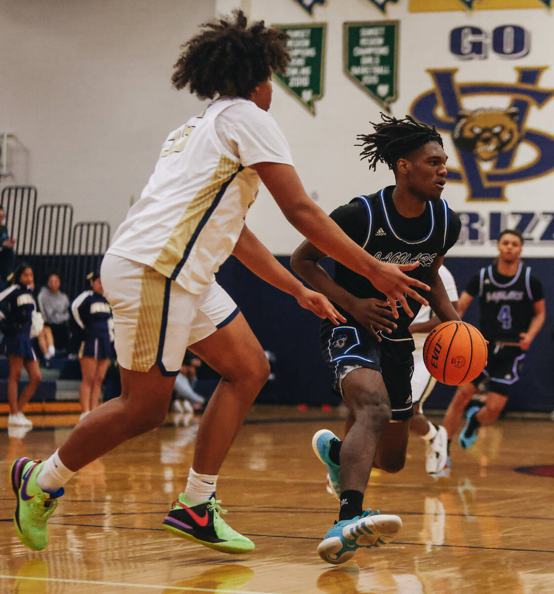 Desert Pines forward Damonte Duhart (3) dribbles the ball during a game at Spring Valley High S ...