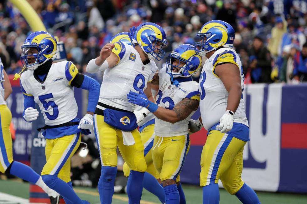 Los Angeles Rams running back Kyren Williams (23) celebrates with quarterback Matthew Stafford ...